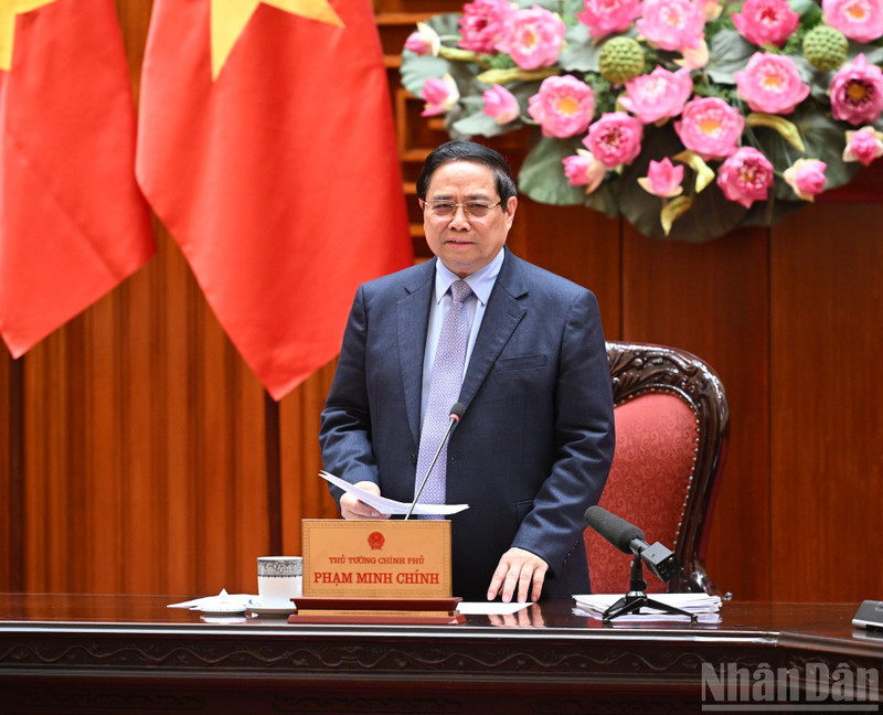 范明正总理在会上发表讲话。