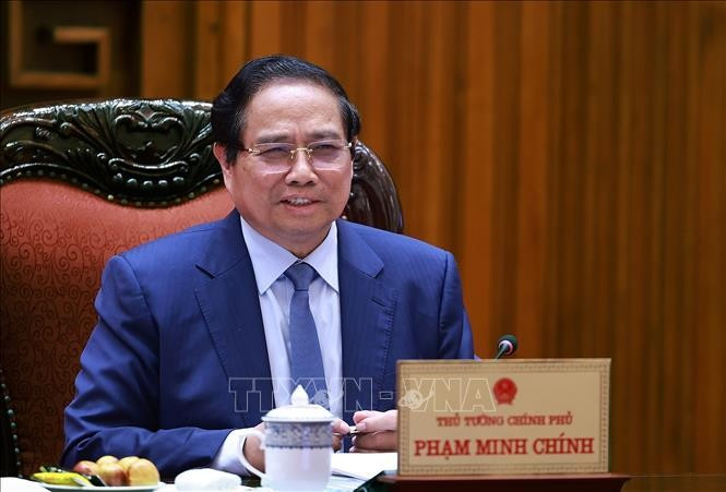 越南政府总理范明正主持召开与CT集团领导的工作会议。（图片来源：越通社）