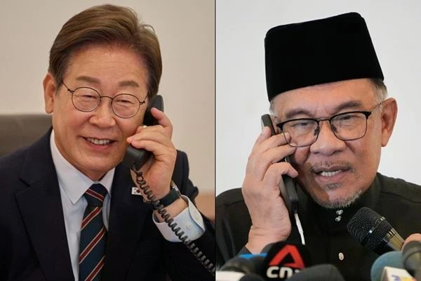 韩国总统李在明与马来西亚总理安瓦尔·易卜拉欣通话。（图片来源：YONHAP News/越通社）