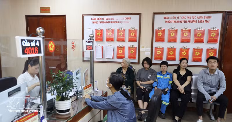 两级地方政府模式获得民群和企业的支持。（图片来源：越通社）