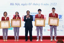 越南政府总理范明正出席由越南文化体育与旅游部举行的第31届东南亚运动会总结表彰仪式。