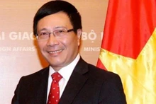 越南政府副总理兼外交部长范平明。