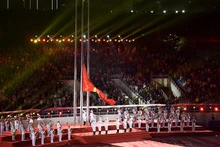 第31届东运会开幕式向国旗敬礼仪式。（陈海 摄）