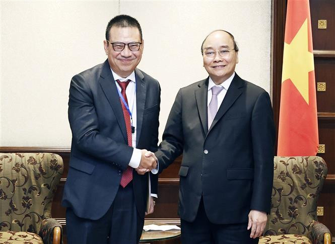 越南国家主席阮春福会见SCG集团主席兼首席执行官Roongrote Rangsiyopash。（图片来源：越通社）