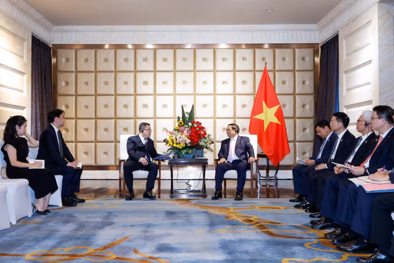 越南政府总理范明正会见中国电建集团副总经理王小军。（图片来源：越通社）
