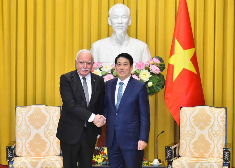 国家主席梁强和巴勒斯坦总统的特使里亚德·马尔基。