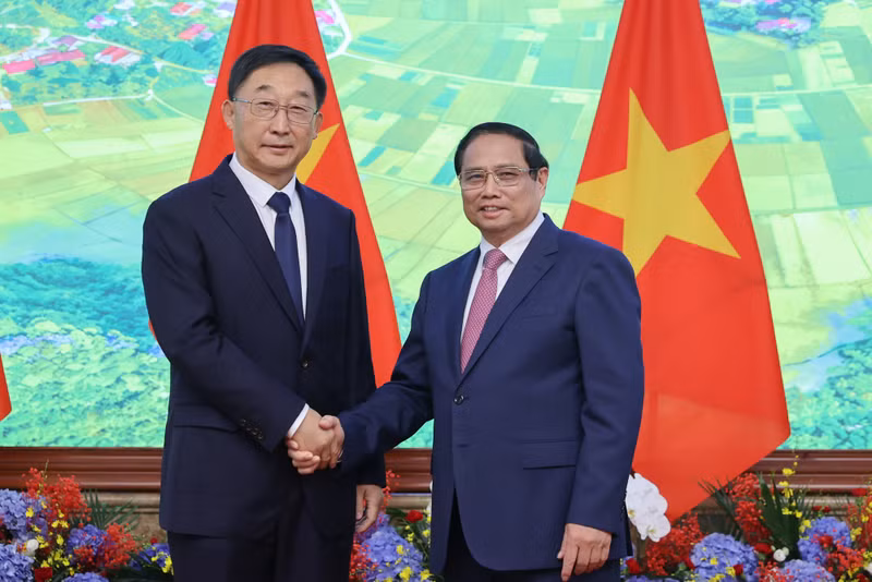 越南政府总理范明正会见广西人民代表会议常务委员会委员长刘宁。（图片来源：越通社）