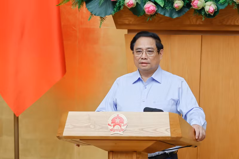 越南政府总理范明正发表讲话。（图片来源：VGP）