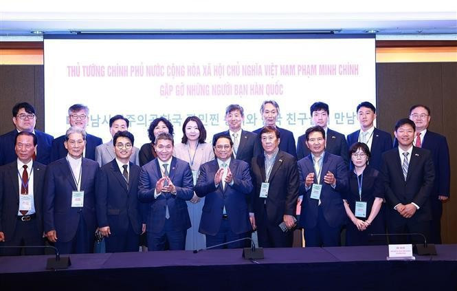 越南政府总理范明正会见韩国友人。