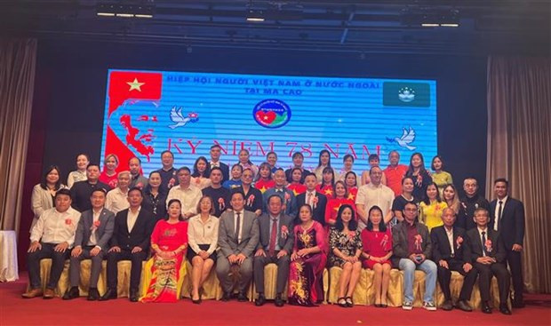 参加活动的代表合影留念。（图片来源：越通社）