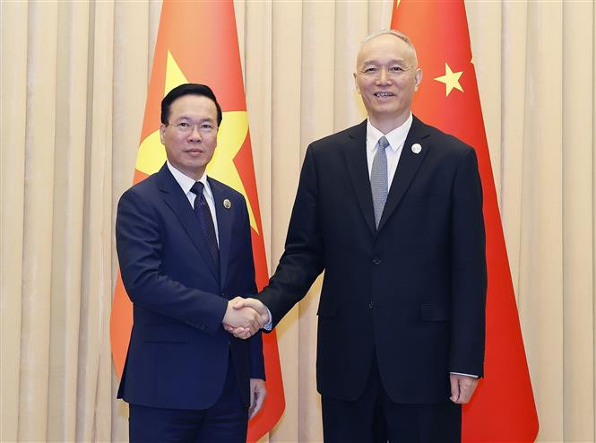 越南国家主席武文赏会见中共中央书记处书记蔡奇。（图片来源：越通社）