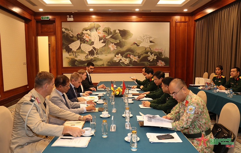 会谈场景。（图片来源·：人民军队报）