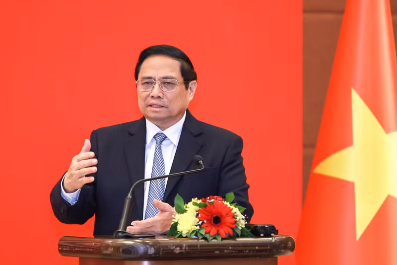 越南政府总理范明正发表讲话。（图片来源：VGP）