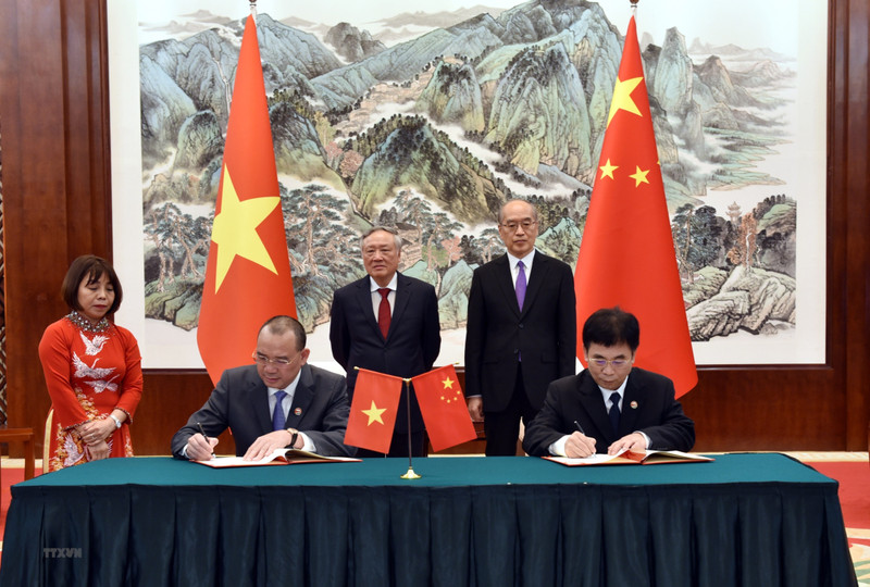 签署仪式现场。（图片来源：越通社）