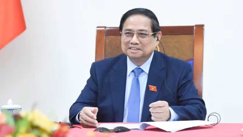 越南政府总理范明正与新加坡总理黄循财通电话。