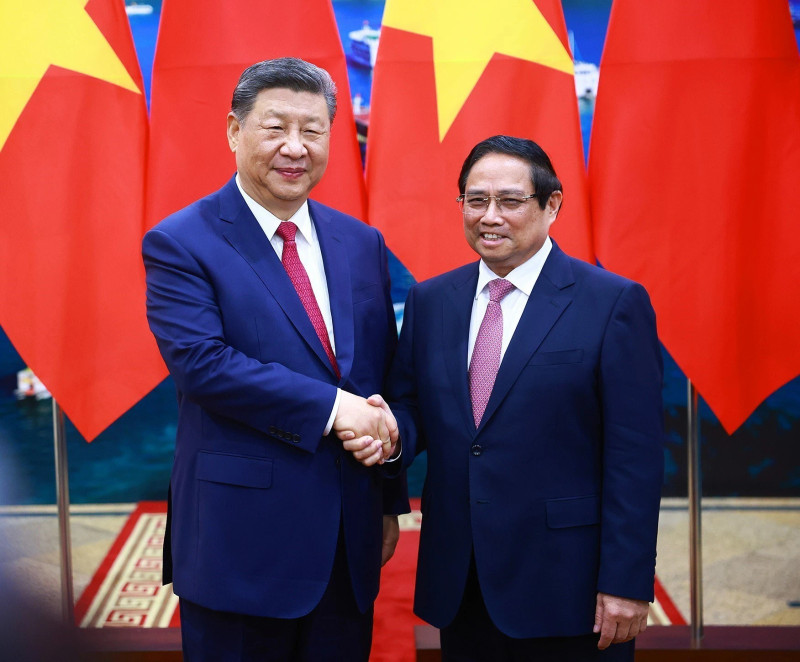 越南政府总理范明正会见中共中央总书记、中国国家主席习近平。