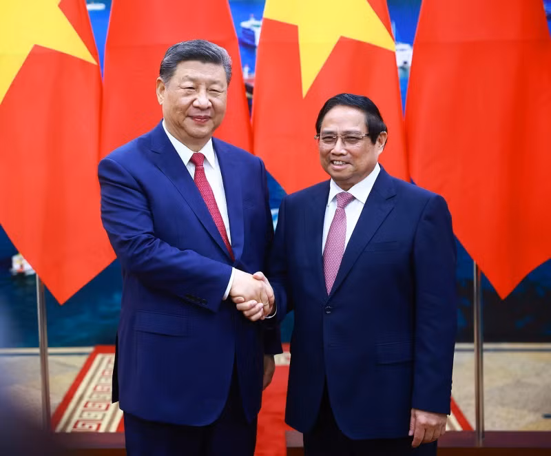 越南政府总理范明正会见中共中央总书记、中国国家主席习近平。