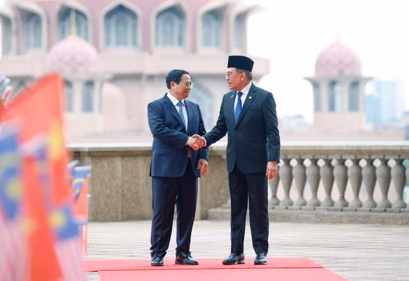 马来西亚总理易卜拉欣和越南政府总理范明正。 马来西亚总理易卜拉欣和越南政府总理范明正。