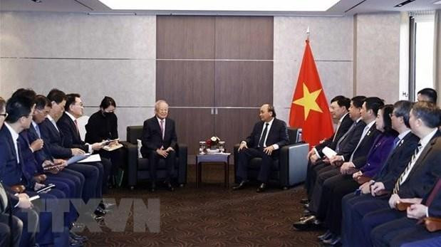 国家主席阮春福会见韩国希杰集团董事长兼首席执行官孙京植。（图片来源：越通社）