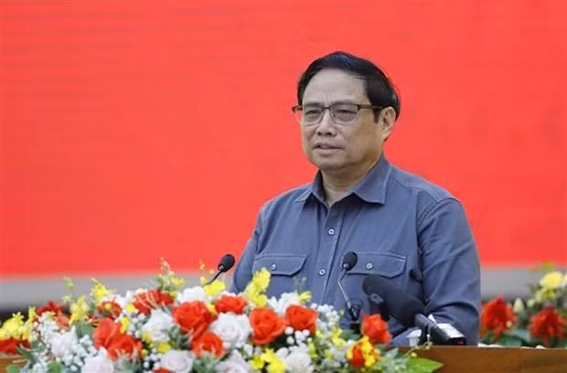 范明正总理在会上发表讲话。（图片来源：越通社）