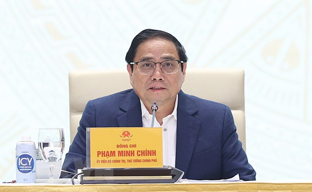 范明正总理在会上发言。