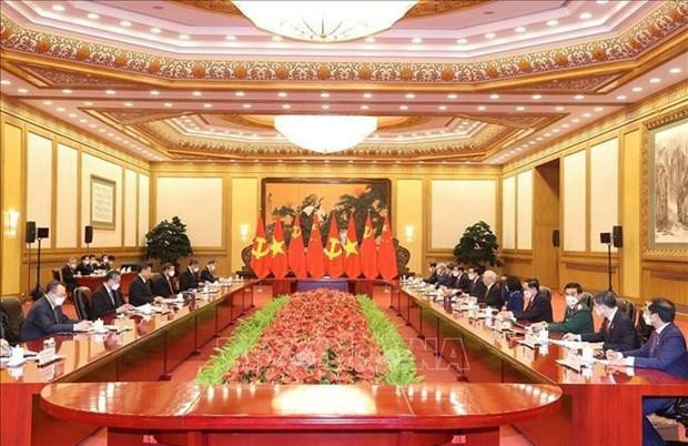 越共中央总书记阮富仲与中共中央总书记、中国国家主席习近平举行会谈。（图片来源：越通社）