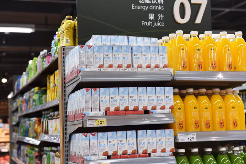TH鲜奶上架中国连锁超市。