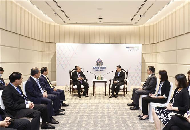 越南国家主席阮春福会见中国香港特别行政区行政长官李家超。（图片来源：越通社）