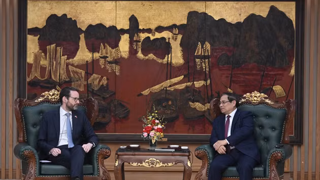 越南政府总理范明正会见英国驻越南大使伊恩·弗鲁【组图】