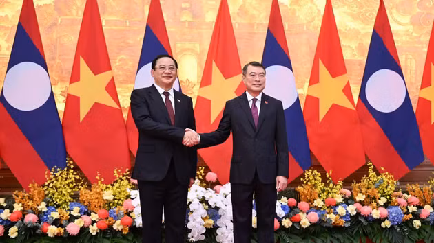 越南政府总理黎明兴和老挝总理宋赛·西潘敦。