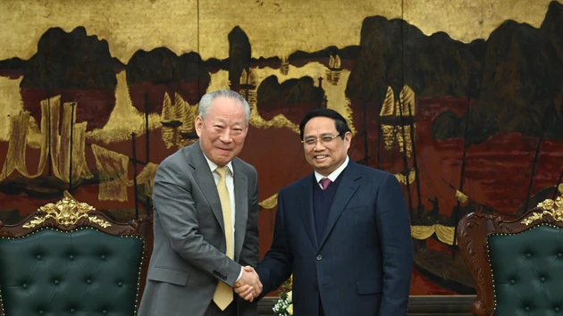 越南政府总理范明正会见中国太平洋建设集团创始人严介。
