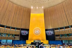 第二届国际移民审查论坛。（图片来源：越南外交部）
