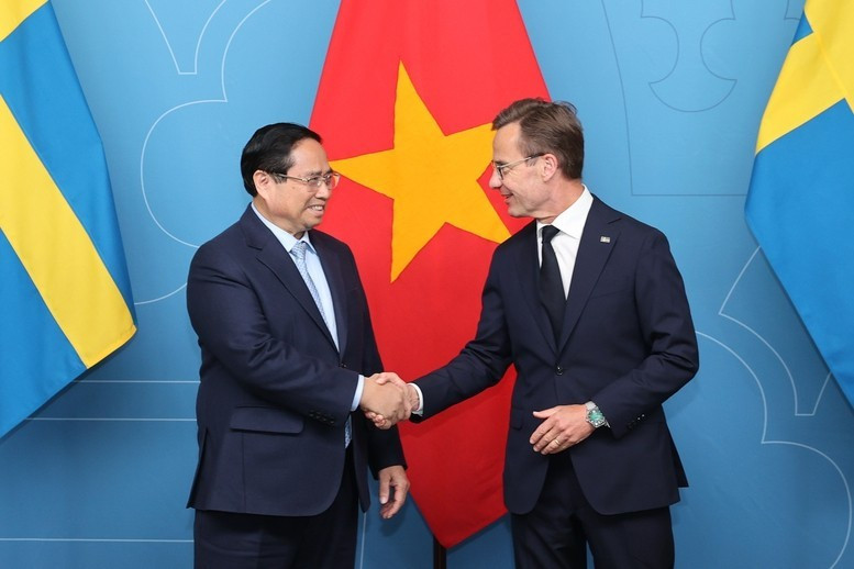 越南政府总理范明正和瑞典首相乌尔夫·克里斯特松。（图片来源：政府门户网站）