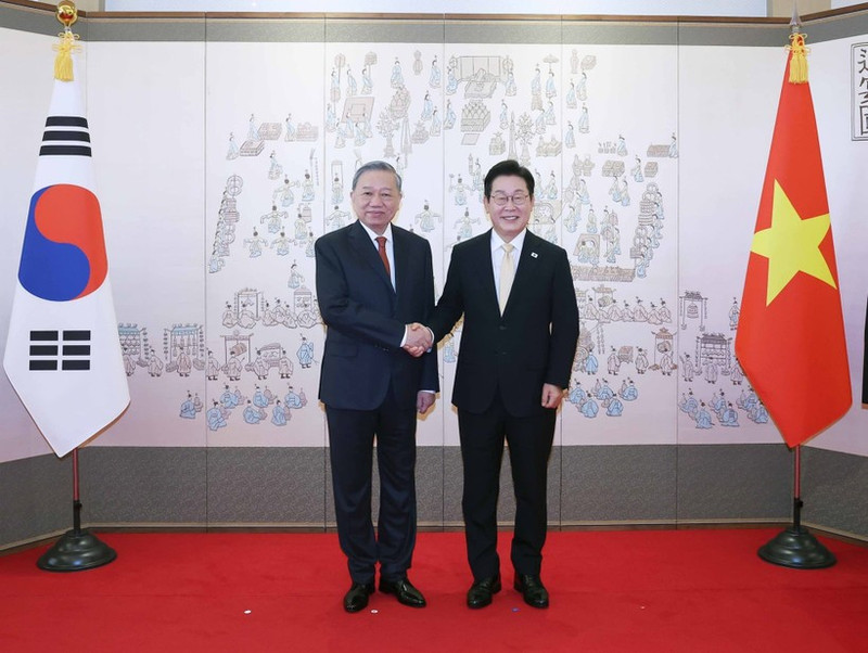 越共中央总书记苏林与韩国总统李在明。（图片来源：越通社）