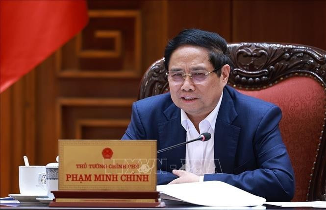 范明正总理主持召开政府常务委员会与各部委和地方会议。（图片来源：越通社）