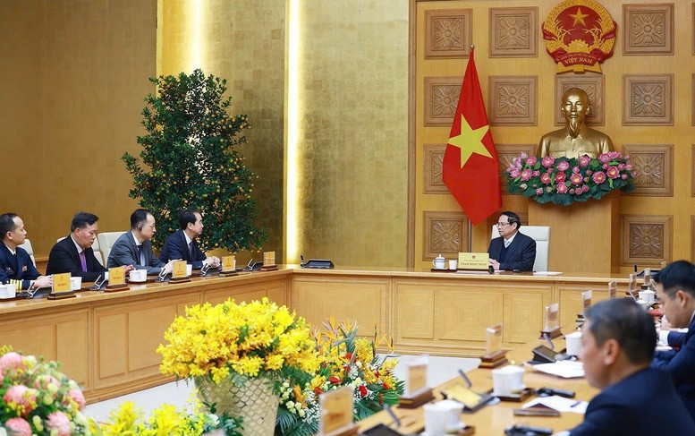 政府总理范明正会见中国驻越南特命全权大使何炜。（图片来源：政府网）