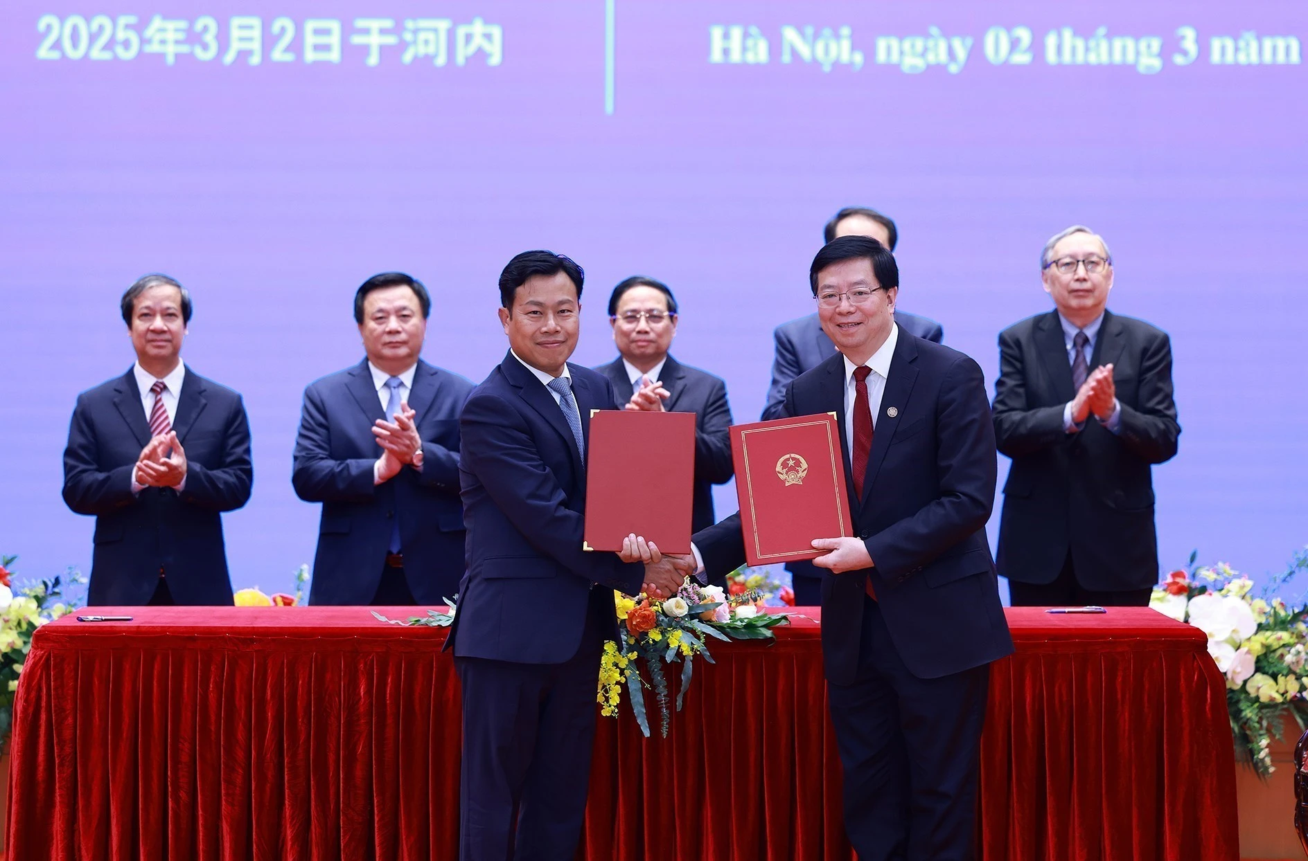 关于建立“越中大学网络”的谅解备忘录换文仪式。（图片来源：越通社）