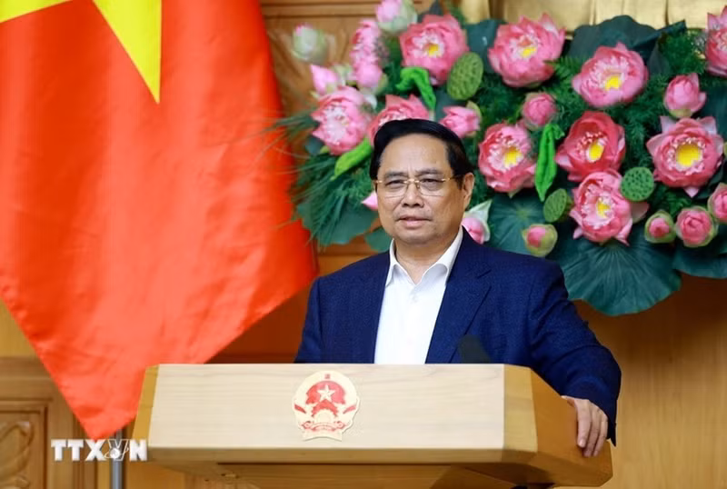 范明正总理在会议上发表讲话。（图片来源：越通社）