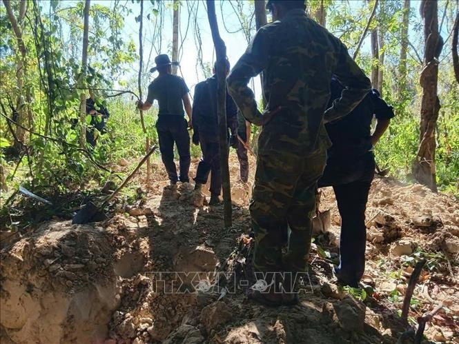 K53工作队在老挝搜寻越南烈士遗骸。（图片来源：越通社）