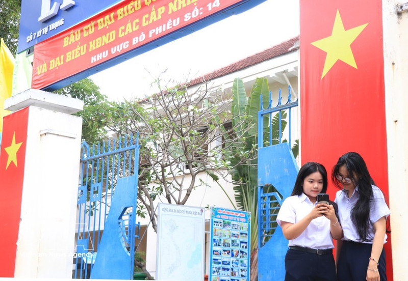 在2026-2031年任期国会代表和各级人民议会代表选举日的氛围中，河静省各学校的宣传工作广泛开展。（图片来源：越通社）