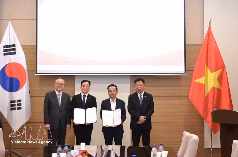 签约仪式现场。（图片来源：越通社）