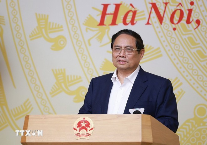 范明正总理在会上发表总结性讲话。(图片来源:越通社) tt97.jpg