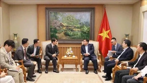 会见场景。（图片来源：越通社）