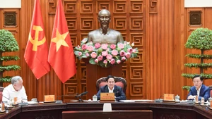 越南政府总理范明正主持有关越南进出口商品税收解决方案的会议【组图】
