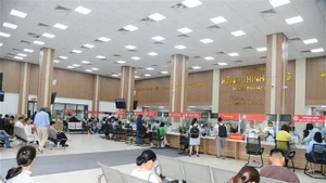 广宁省两级地方政权试点运行日顺利展开。（图片来源：越通社） 