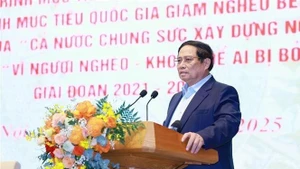 越南政府总理范明正发表讲话。（图片来源：越通社）