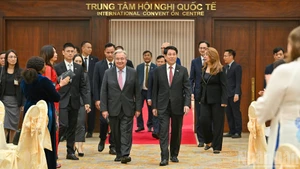 国家主席梁强与联合国秘书长安东尼奥·古特雷斯出席招待会。