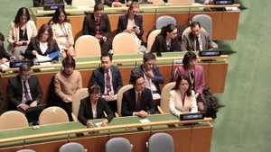 参加联合国人权理事会成员投票的越南代表团。（图片来源：越通社）