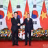 越南政府总理黎明兴与韩国总统李在明。