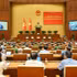 2026年7月1日，全国政治体制总体组织架构和三级政府模式运行一周年阶段性总结会议现场。